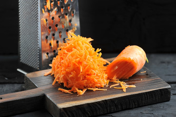 carrots grated on a grater close-up