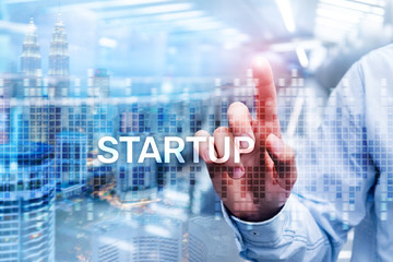 Startup concept with double exposure diagrams blurred background.