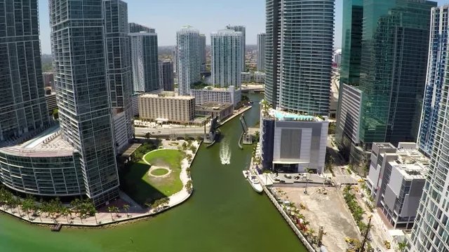 Brickell Miami River Aerial Fly between Buildings