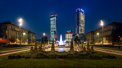 Fototapeta na wymiar A new tower is growing in Milan by night