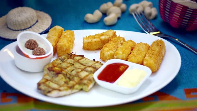 Yucca fried sticks with ketchup and gift