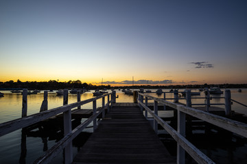 Obraz premium Walkway to Jetty, leading lines, sunset, jetty, sunset, water sea, calm.