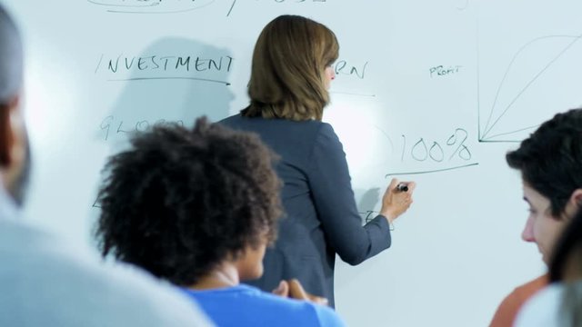 Class multi ethnic mature students attending postgraduate educational school to achieve further qualifications  