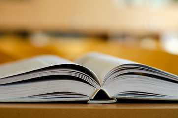 open book on the table. opening book. the path to knowledge. soon to school. back to school. library