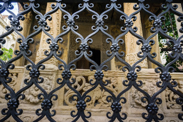 Detail of the forged metal fence of the eastern Orthodox Stavropoleos Church in the old city area of Bucharest, Romania