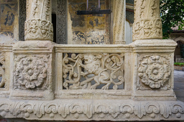 Ornamental sculptures on the walls of the Eastern Orthodox Stavropoleos Church in the old city area...