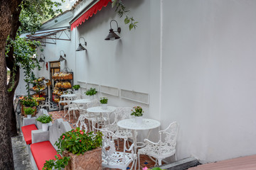 Street Side Cafe Tables and Chairs on a Sidewalk