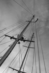Mast of sailboat in the clouds