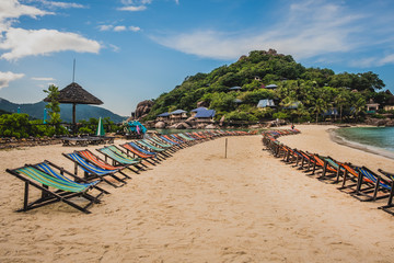 colorful beach chairs on the white sand beach at koh Nang Yuan in Suratthani province Thailand