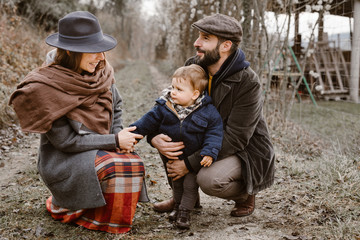 Loving family in autumnal countryside