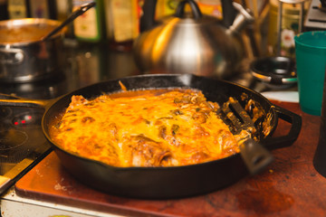 Homemade Cheese Enchiladas in Cast Iron Pan