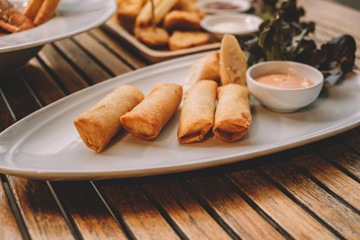 Spring rolls with shrimp with sweet chili sauce. Asian cuisine.
