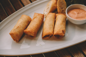 Spring rolls with shrimp with sweet chili sauce. Asian cuisine.