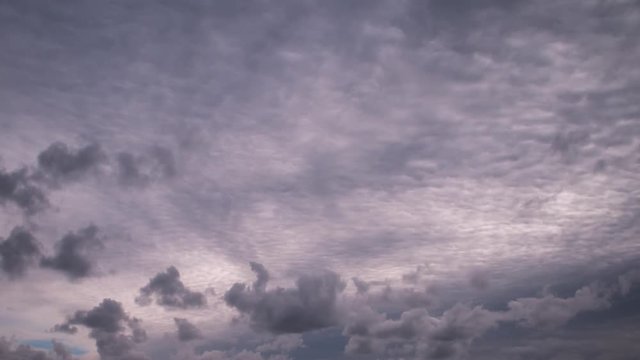 Different cloud layers near a storm front, timelapse.