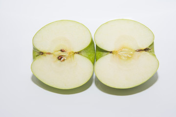 half of apple on white background