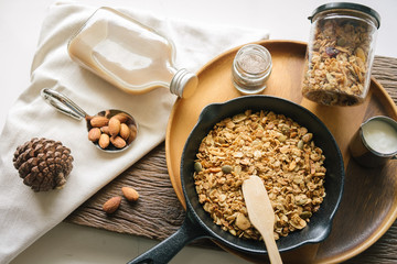 Fresh and Healthy breakfast with the grain and yogurt on the black pan close up shoot. minimal japanese style