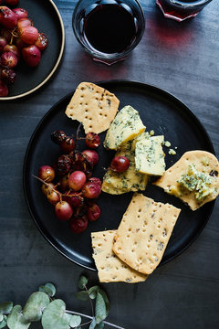 Cheese and biscuits with roasted grapes.