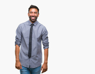 Adult hispanic business man over isolated background sticking tongue out happy with funny expression. Emotion concept.