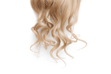 Natural wavy blond hair on white background