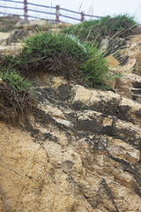 Macro detail of rock mountain and stairs in background