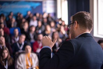 businessman giving presentations at conference room