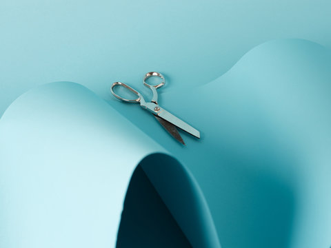 Paper and scissors in arrangement