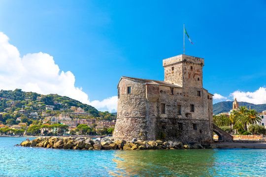 Beautiful view of coastline and picturesque seaside village Rapallo. Little harbor and houses.