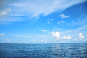 Naklejka na ściany i meble Blue sky and beautiful cloud with sea background. landscape background.