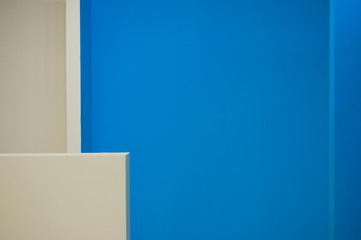 beige and blue walls in the interior. abstract composition.