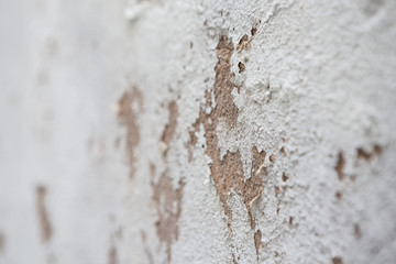 White concrete wall abrasion