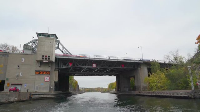 21431_Getting_under_the_footbridge_on_the_water_channel_in_Stockholm_Sweden.mov