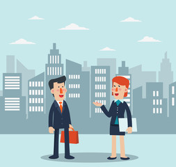 Business man and business woman talking and discussing in a city street