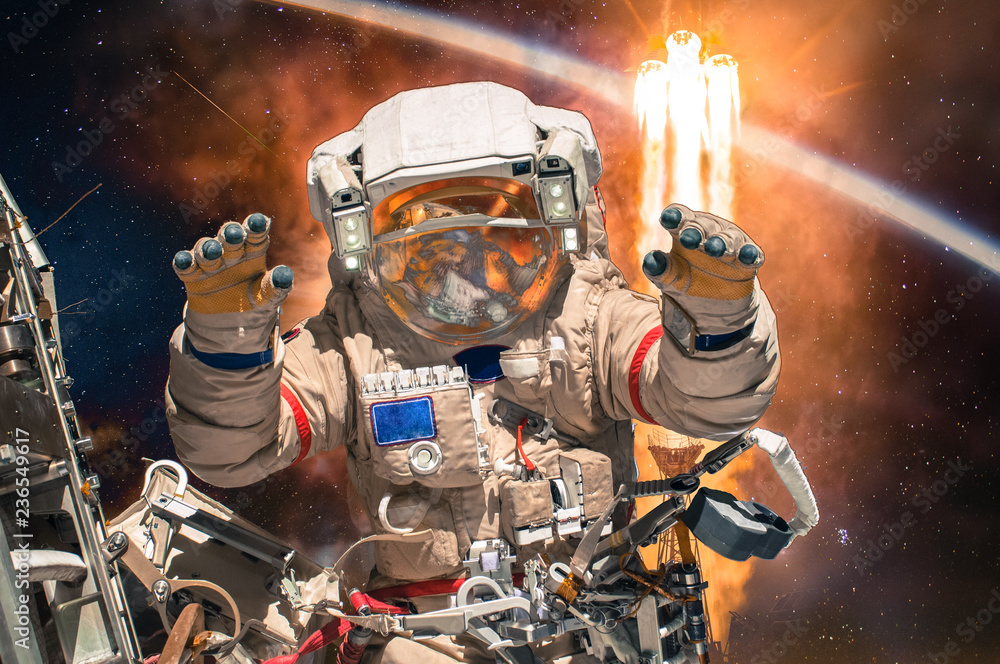 Poster astronaut in outer space. people in space. elements of this image furnished by nasa.