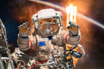 Astronaut in outer space. People in space. Elements of this image furnished by NASA.