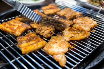 Cooking Korean style barbeque pork and deodeok