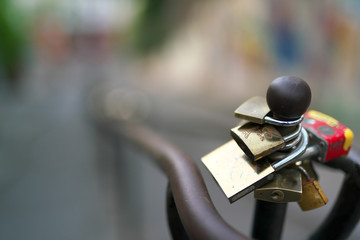 Paris,France-October 18, 2018: Old padlocks hooked on the handrail of staircase in Montmartre, Paris