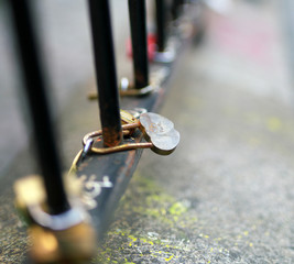 Paris,France-October 18, 2018: Old padlocks hooked on the handrail of staircase in Montmartre, Paris