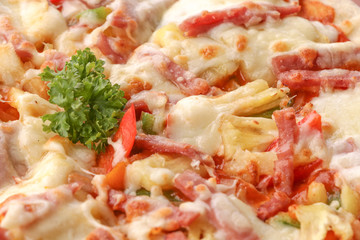 Hot pizza slice on wooden table