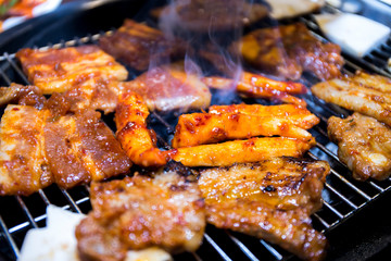 Cooking Korean style barbeque pork and deodeok