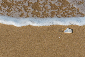 Single Tile on a Sunny Beach