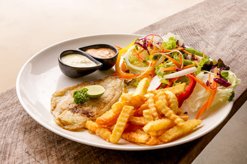 Hot Fish Steak on wooden table