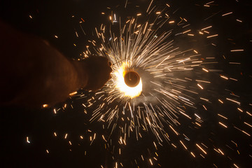 Hand holding fireworks