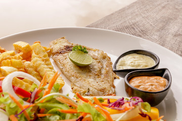Hot Fish Steak on wooden table