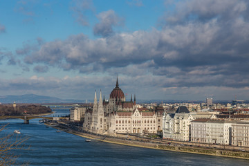 Fototapeta na wymiar view of the embankment of the river Danube and old Parliament building in Budapest , Hungary