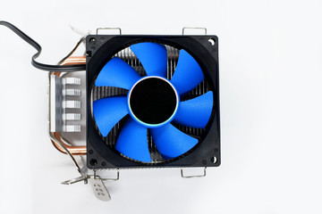 Computer fan processor cooler blue ventilator top view on white background with copy space for text. 