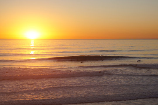 San Diego surf and surfers at sunset