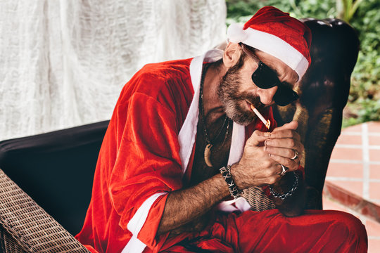 Santa lighting a cigarette