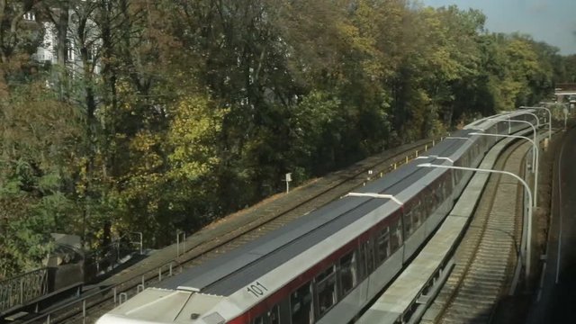 view from the window of a traveling metro train