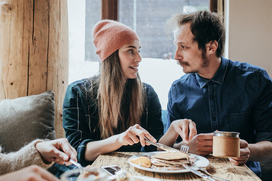 Couple Enjoying Winter Vacation in Mountain