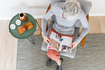Woman Reading a Magazine